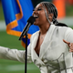 Jazmine Sullivan performs during the national anthem before the NFL Super Bowl 55 football game between the Kansas City Chiefs and Tampa Bay Buccaneers, Sunday, Feb. 7, 2021, in Tampa, Fla.